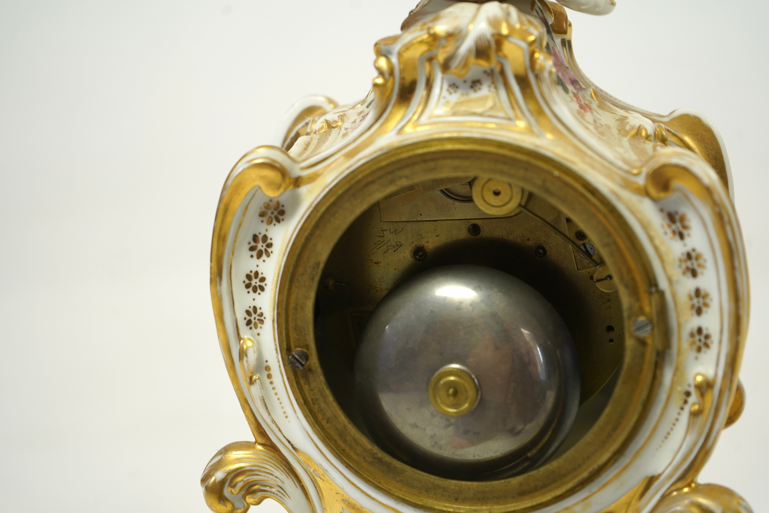 A mid 19th century French porcelain floral and gilt decorated clock, by Jacob Petit